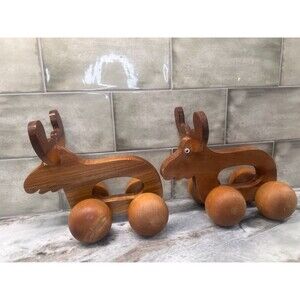 Vintage Hand carved Wooden Hand Held MOOSE ON WHEELS Toy Or Back Massager Set